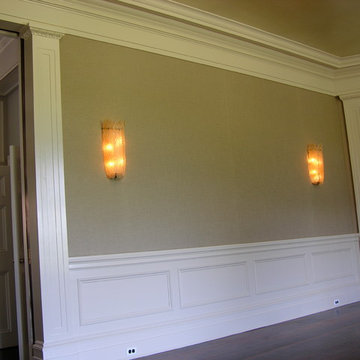 Dining room with plain fabric walls
