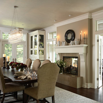 Dining Room with renovated two sided fireplace into Porch