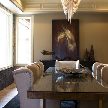 Dining Room with Stacked Stone Accent Wall and Dramatic Lighting