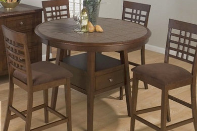 Light wood floor dining room photo in Toronto with gray walls and no fireplace