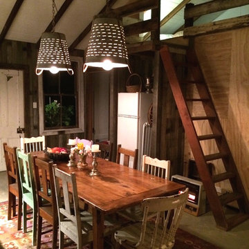 Dining table and old grape baskets made into pendant lights