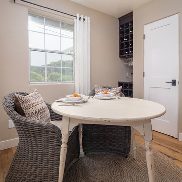 Distressed Dining Table in Kitchen/Dining Room of Farmhouse Remodel