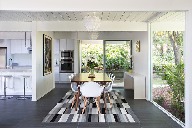 Midcentury Dining Room by Klopf Architecture