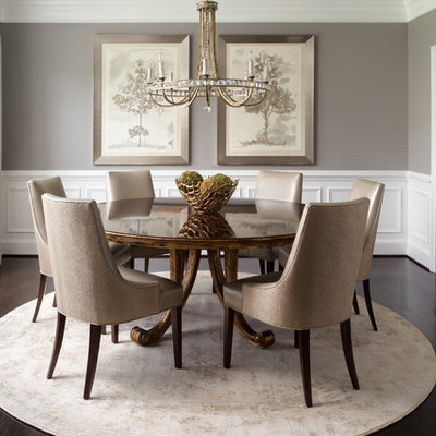 Example of a mid-sized transitional dark wood floor and brown floor enclosed dining room design in DC Metro with gray walls
