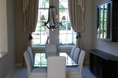 Elegant dining room photo in Miami