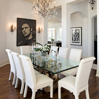 Example of a trendy dark wood floor dining room design in Indianapolis with white walls