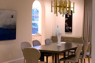Mid-sized beige floor dining room photo in Boston with white walls