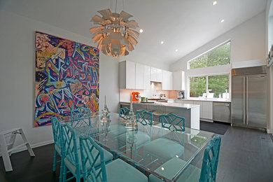 Inspiration for a contemporary dark wood floor kitchen/dining room combo remodel in New York with white walls