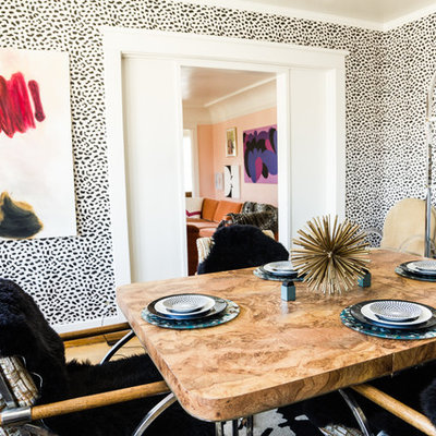 Eclectic medium tone wood floor dining room photo in Los Angeles with multicolored walls
