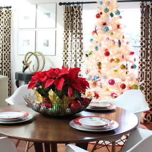 Example of an eclectic dining room design in Orange County