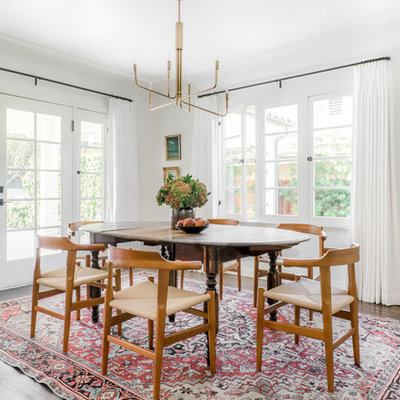 Mid-sized eclectic dark wood floor and brown floor dining room photo in Los Angeles with white walls