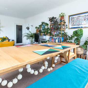 Eclectic open plan living-dining room