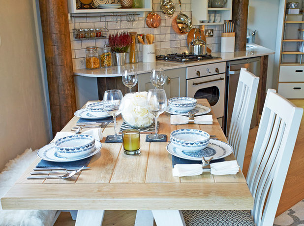 Rustic Dining Room by Cream & Black Interior Design