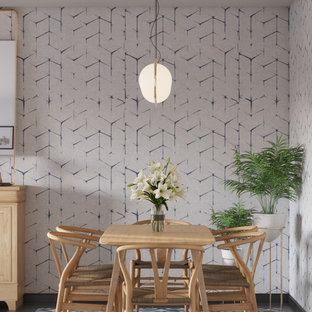 Idée de décoration pour une salle à manger nordique fermée et de taille moyenne avec un mur bleu, un sol en carrelage de céramique et un sol bleu.