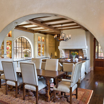 Kitchen/dining room combo - large mediterranean dark wood floor kitchen/dining room combo idea in Other with beige walls and no fireplace
