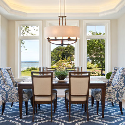 Inspiration for a large coastal light wood floor great room remodel in Grand Rapids with beige walls