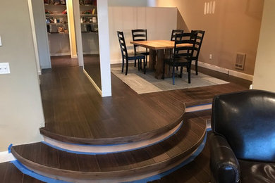 Inspiration for a mid-sized transitional bamboo floor and brown floor kitchen/dining room combo remodel in Seattle with brown walls and no fireplace
