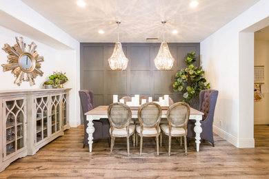 Example of an eclectic dining room design in Orange County