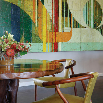 Example of a trendy dark wood floor dining room design in Hawaii