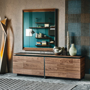 Esempio di una grande sala da pranzo aperta verso il soggiorno minimalista con pareti blu, pavimento in gres porcellanato e pavimento grigio