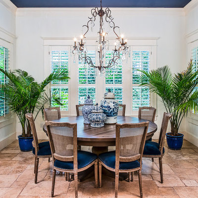Inspiration for a mid-sized timeless terra-cotta tile and beige floor kitchen/dining room combo remodel in Austin with white walls and no fireplace