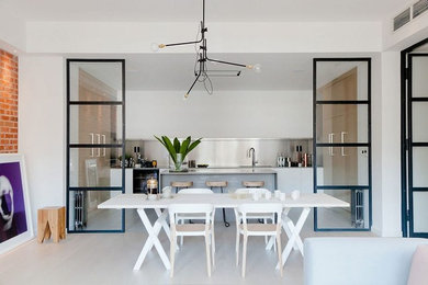 This is an example of a contemporary dining room in London.