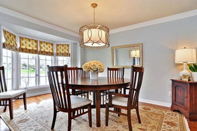 Example of a transitional dining room design in Ottawa