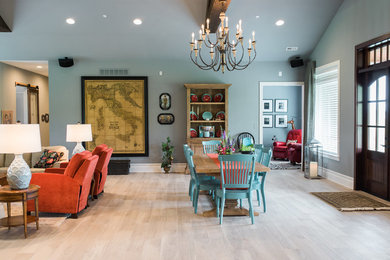 Great room - large eclectic light wood floor and gray floor great room idea in Baltimore with gray walls and no fireplace