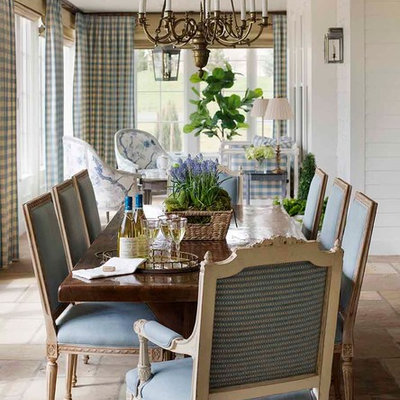 Inspiration for a large timeless limestone floor great room remodel in Los Angeles with white walls