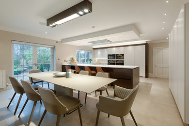 Inspiration for a medium sized contemporary kitchen/dining room in Cheshire with grey walls and grey floors.