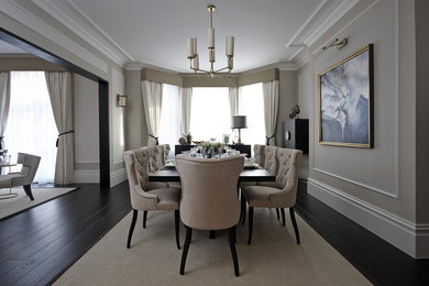 Photo of a dining room in London with feature lighting.