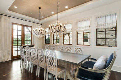 Large elegant dark wood floor enclosed dining room photo in Denver with white walls and no fireplace