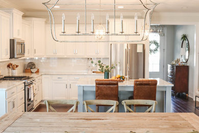 This is an example of a large farmhouse open plan dining room in Other with grey walls, dark hardwood flooring, no fireplace and brown floors.