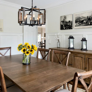 Enclosed dining room - mid-sized cottage dark wood floor and brown floor enclosed dining room idea in Atlanta with white walls