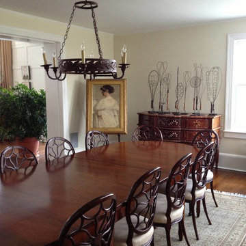 faux mahogany painted dining table with faux inlay detail on legs