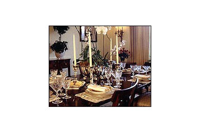 Large elegant medium tone wood floor dining room photo in San Francisco with beige walls