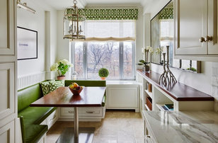 Inspiration for a transitional light wood floor kitchen/dining room combo remodel in New York with white walls