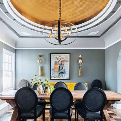 Example of a mid-sized eclectic multicolored floor and tray ceiling enclosed dining room design in San Francisco with gray walls