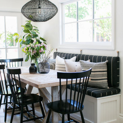 Inspiration for a small coastal light wood floor and beige floor dining room remodel in San Diego with white walls and no fireplace