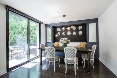Example of a transitional dining room design in Toronto