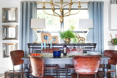 Example of an eclectic dining room design in Omaha