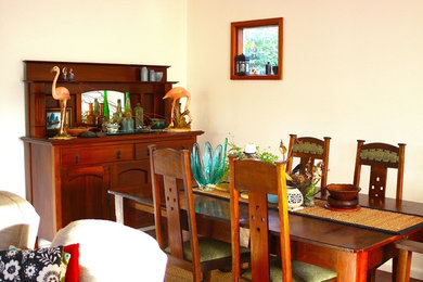 Example of an eclectic dining room design in Newcastle - Maitland
