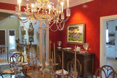 Elegant dining room photo in Philadelphia with red walls