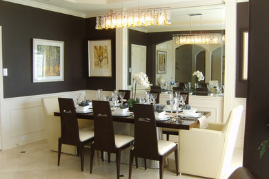 Example of a mid-sized transitional beige floor enclosed dining room design in Dallas with black walls and no fireplace