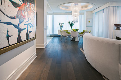 Design ideas for a medium sized contemporary dining room in Toronto with white walls and dark hardwood flooring.