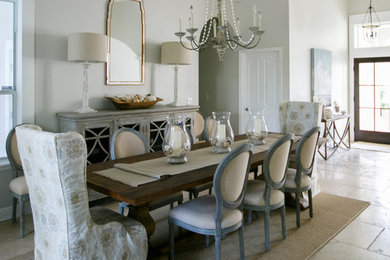 На фото: гостиная-столовая среднего размера в стиле рустика с серыми стенами, полом из известняка и бежевым полом с