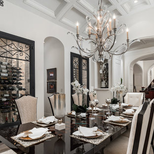 Ispirazione per un'ampia sala da pranzo shabby-chic style chiusa con pareti bianche, pavimento in legno massello medio, camino classico, cornice del camino in pietra e pavimento marrone