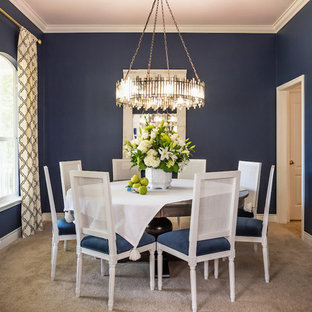 Example of a classic carpeted and gray floor enclosed dining room design in Austin with blue walls and no fireplace