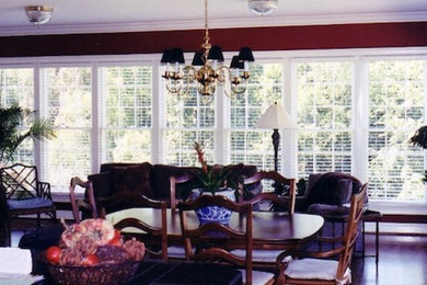 Example of a dining room design in Nashville with red walls