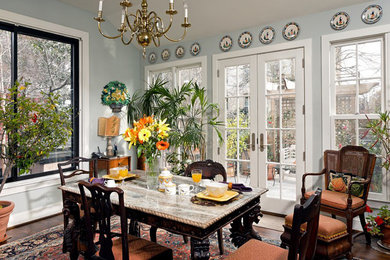 Mid-sized elegant dark wood floor kitchen/dining room combo photo in DC Metro with blue walls and no fireplace